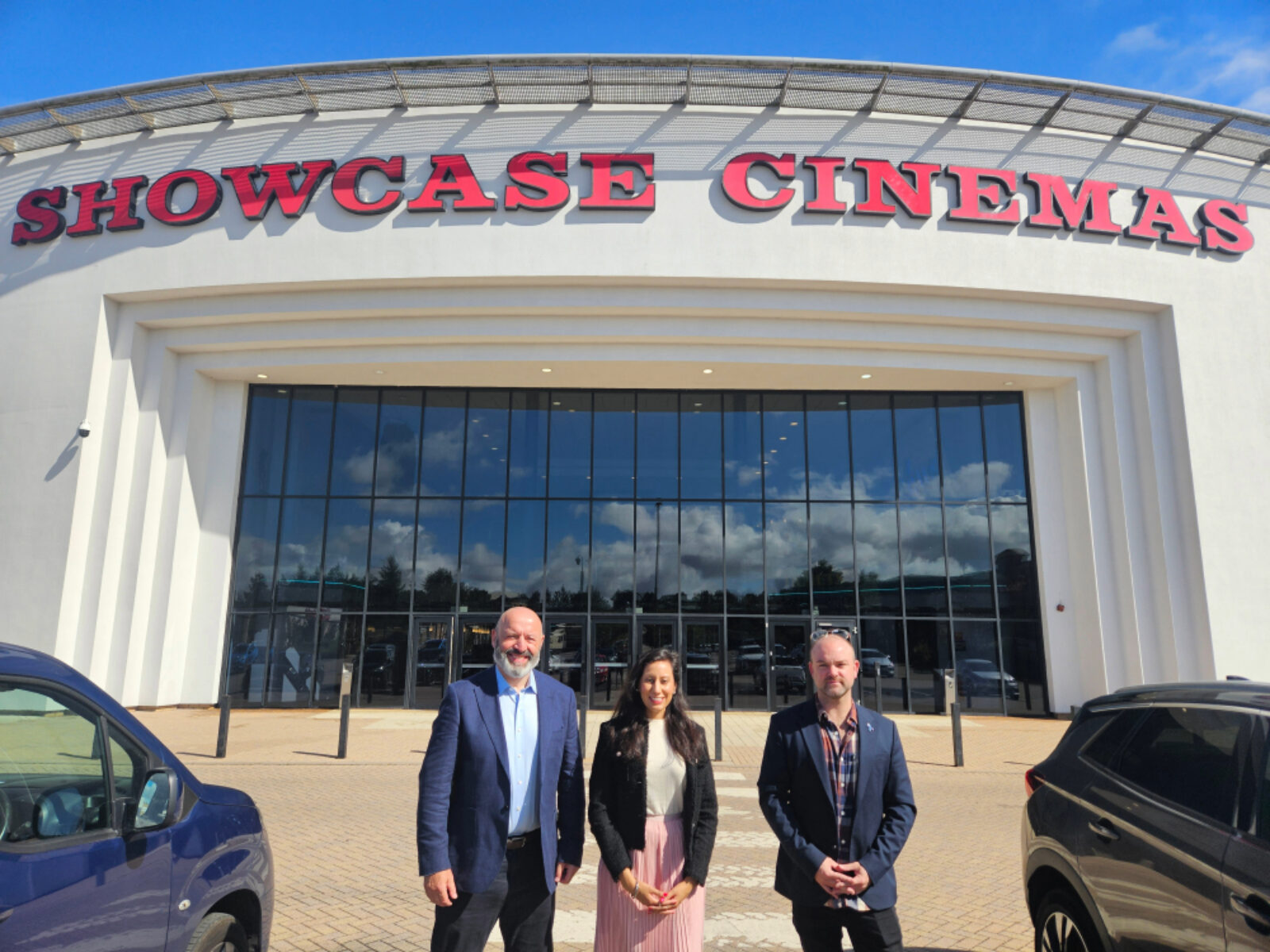 Sonia Kumar MP for Dudley outside Showcase Cinema Dudley with two Showcase Cinema Staff 